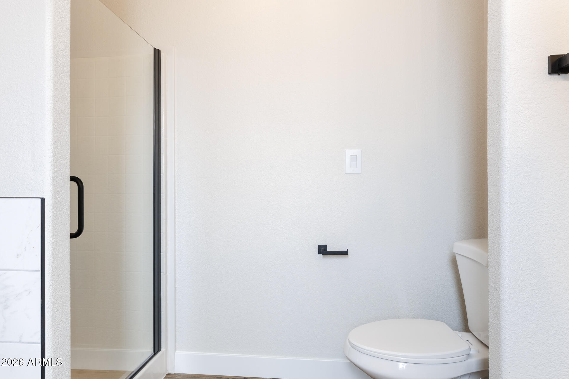 10290 North Katsina Road Casa Grande, AZ 85122 - Photo 27 of 51 a white toilet sitting next to a shower