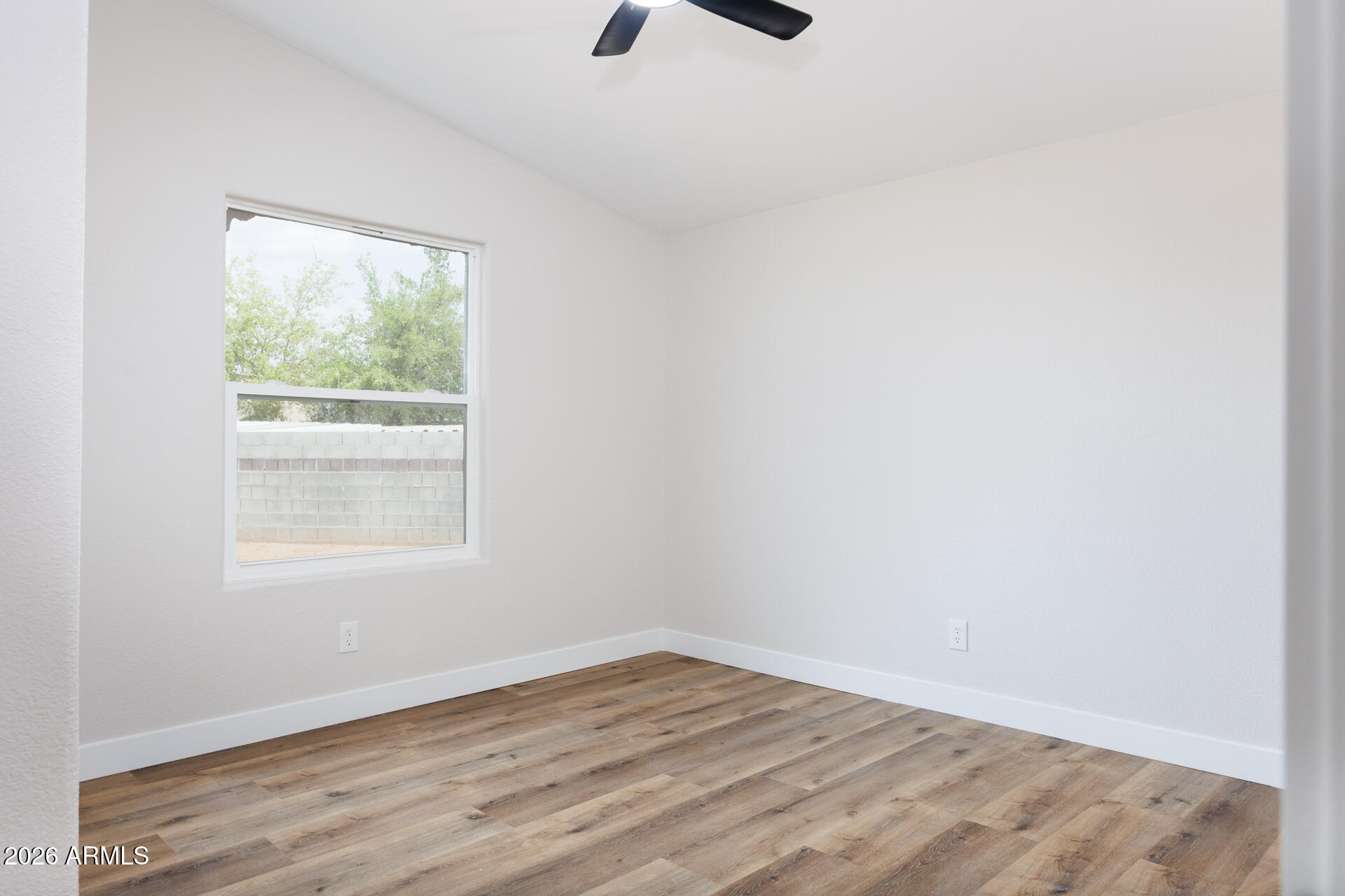 10290 North Katsina Road Casa Grande, AZ 85122 - Photo 31 of 51 an empty room with a window