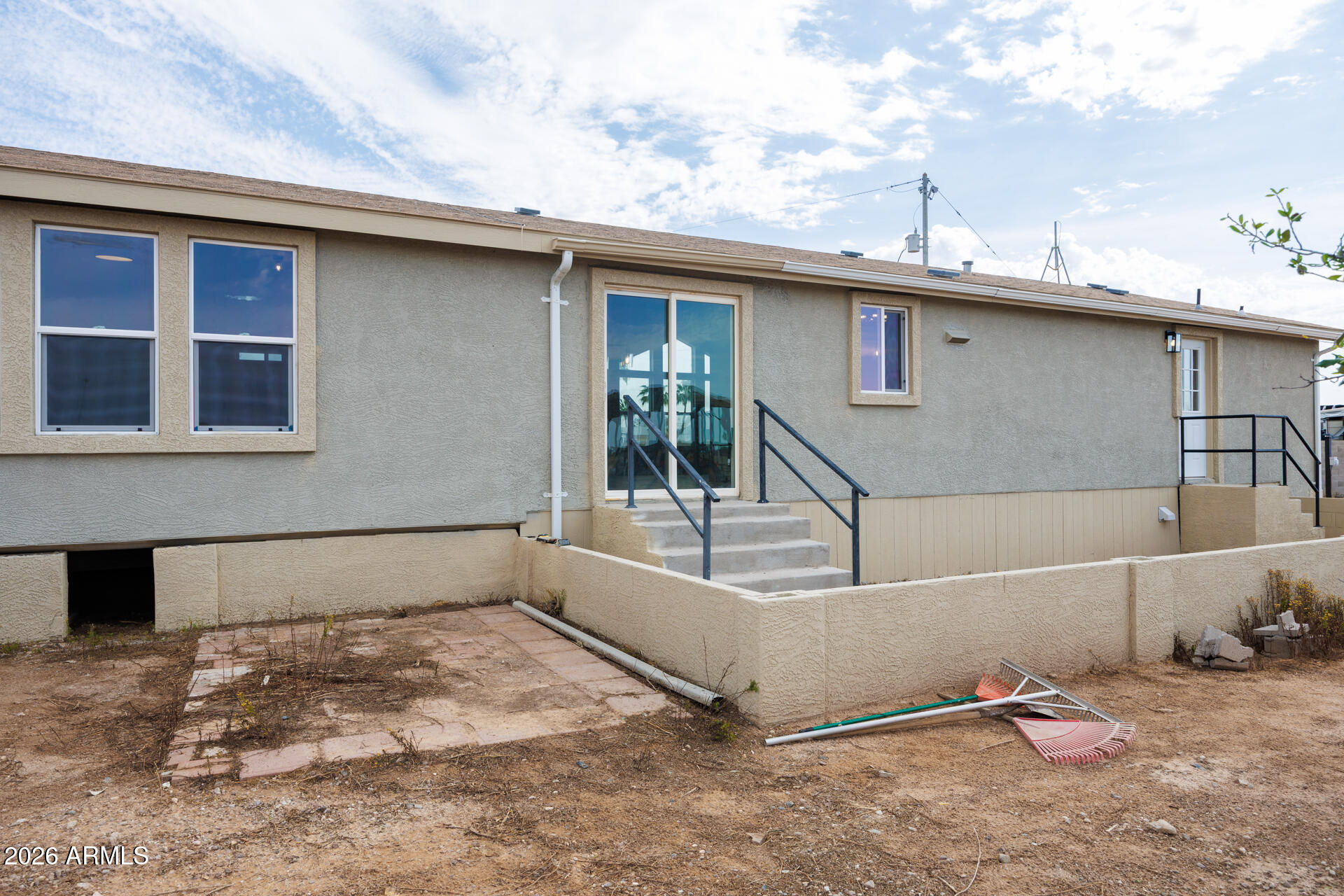 10290 North Katsina Road Casa Grande, AZ 85122 - Photo 34 of 51 a view of a house with a backyard and a window