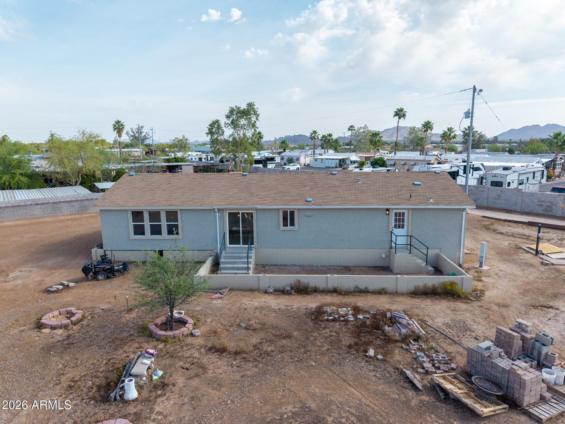 10290 North Katsina Road Casa Grande, AZ 85122 - Photo 36 of 51 an aerial view of a house with a yard and large tree