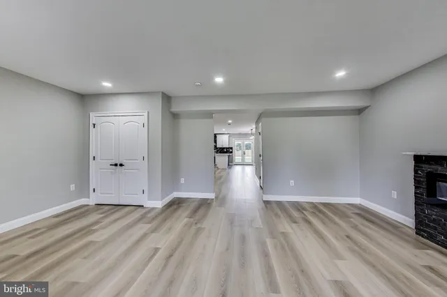 a view of entryway with wooden floor