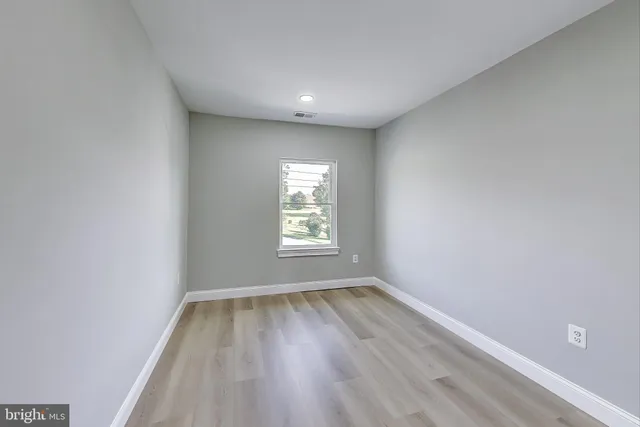 a view of a backyard of the house