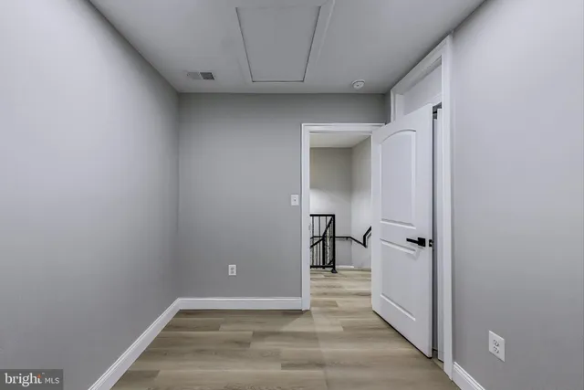 a view of a backyard with a fence