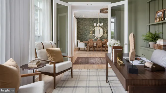 a kitchen with stainless steel appliances granite countertop a stove a sink and white cabinets