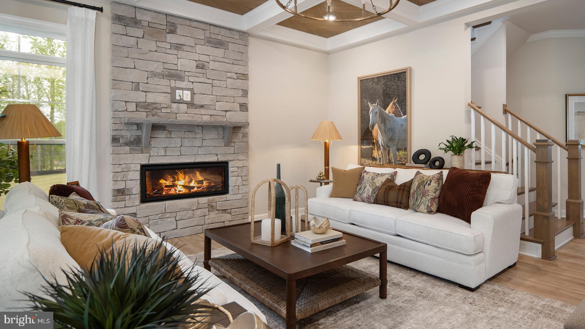 Tbb While Away Drive, Unit RICHMOND Bowie, MD 20716 - Photo 17 of 99 a living room with furniture and a fireplace