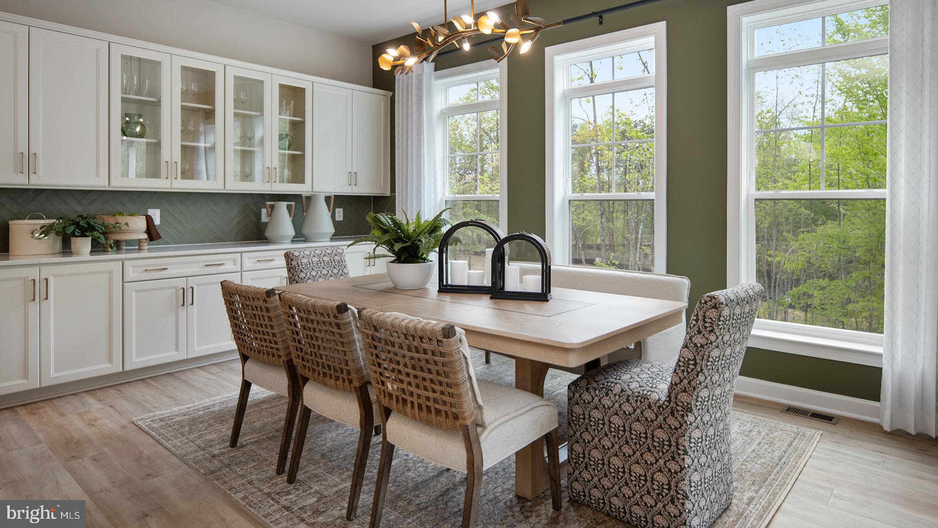 Tbb While Away Drive, Unit RICHMOND Bowie, MD 20716 - Photo 29 of 99 a dining room with furniture window and wooden floor