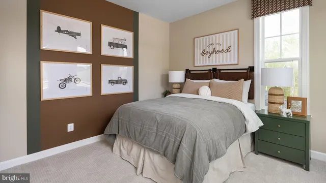 a bedroom with a bed a mirror and wall paintings