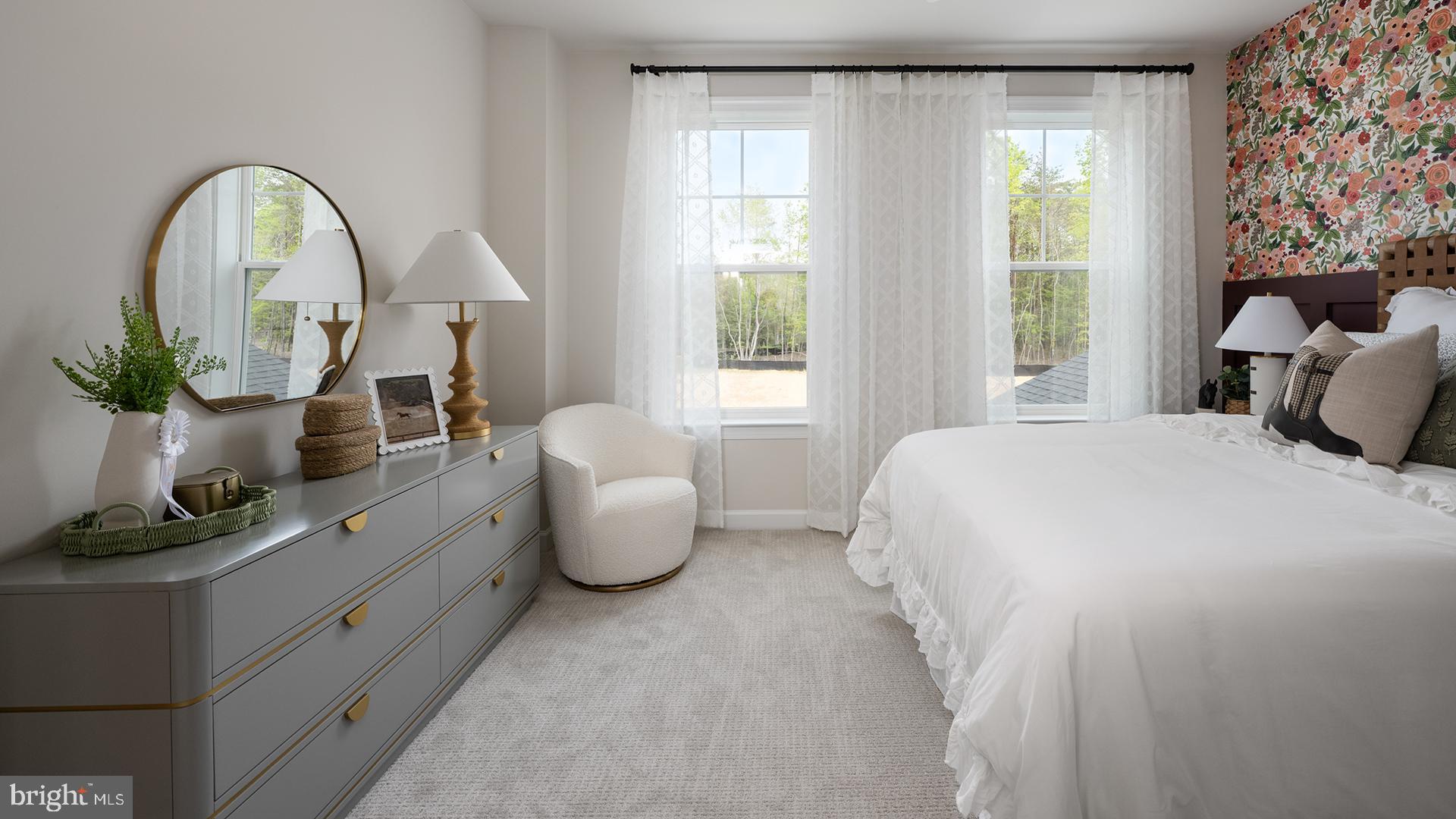 Tbb While Away Drive, Unit RICHMOND Bowie, MD 20716 - Photo 44 of 99 a bedroom with a bed and a large window