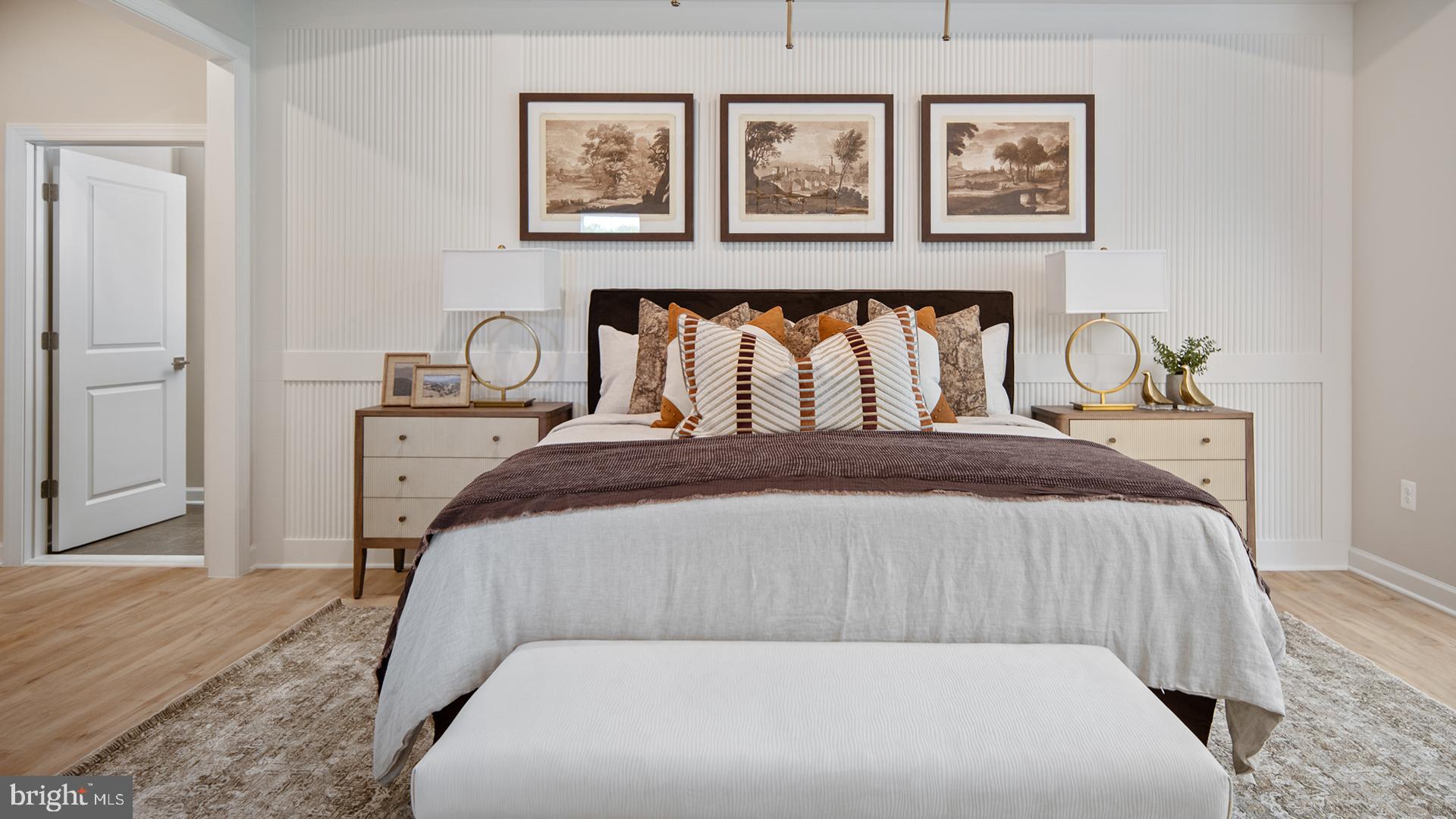 Tbb While Away Drive, Unit RICHMOND Bowie, MD 20716 - Photo 65 of 99 a bed sitting in a bedroom chandelier and a table