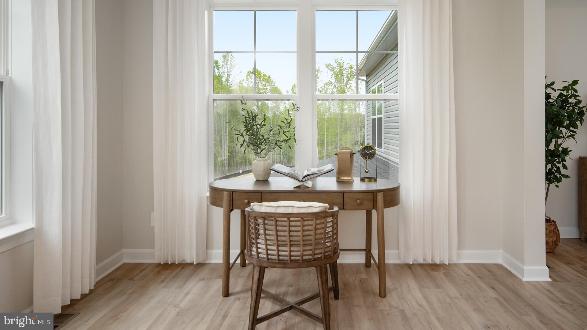 Tbb While Away Drive, Unit RICHMOND Bowie, MD 20716 - Photo 68 of 99 a dining room with furniture window wooden floor