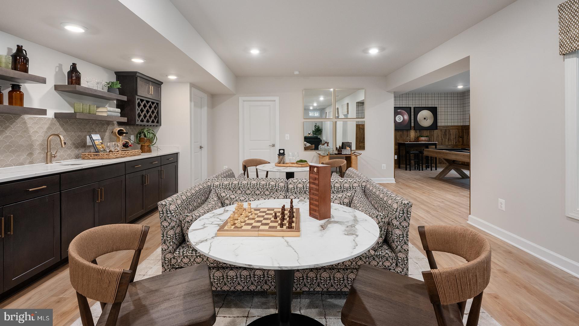 Tbb While Away Drive, Unit RICHMOND Bowie, MD 20716 - Photo 75 of 99 a view of a dining room with furniture