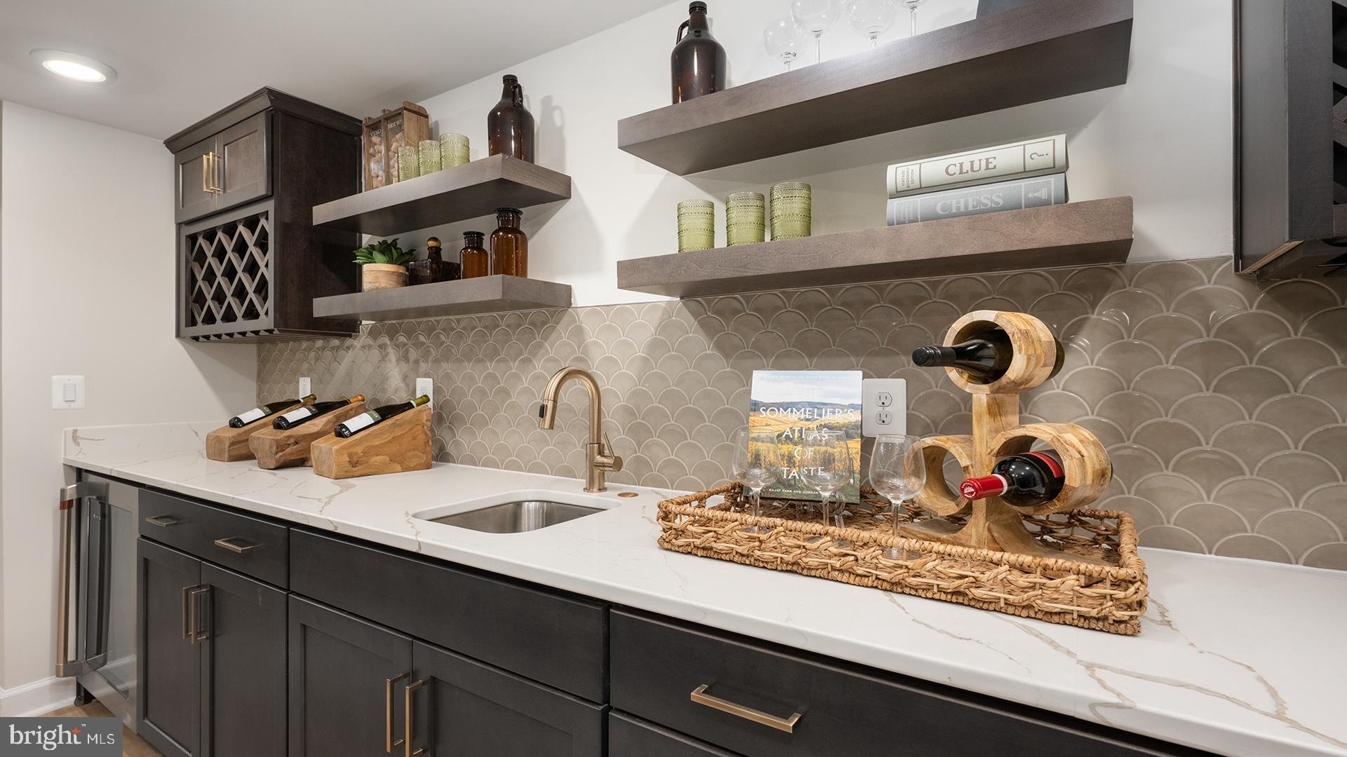 Tbb While Away Drive, Unit RICHMOND Bowie, MD 20716 - Photo 85 of 99 a kitchen with a sink dishwasher and a stove with wooden floor