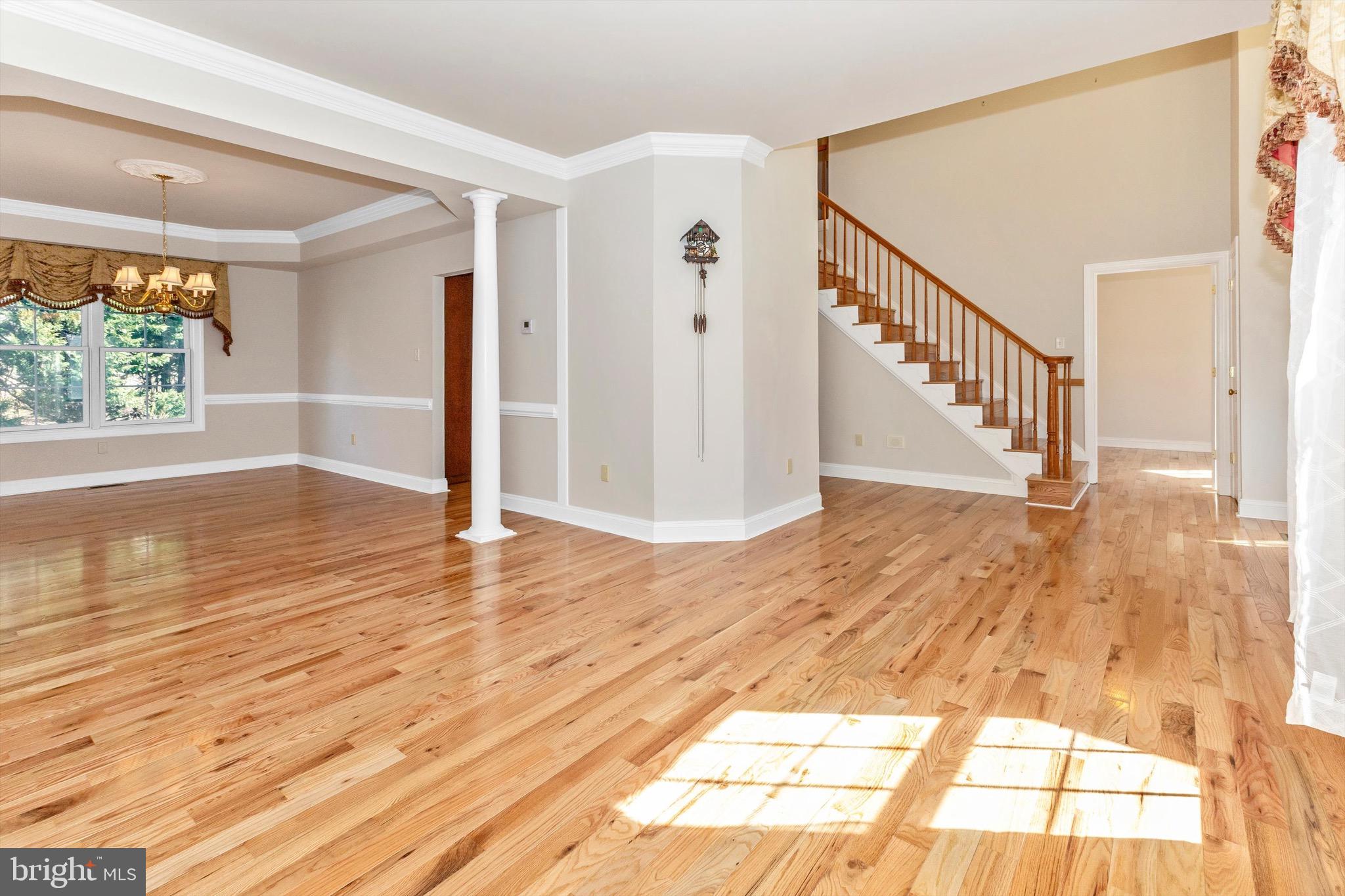 10213 Deep Skies Drive Laurel, MD 20723 - Photo 14 of 56 a view of empty room with wooden floor and fan