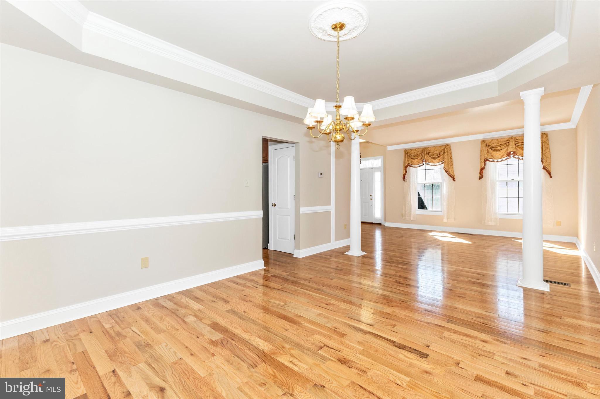 10213 Deep Skies Drive Laurel, MD 20723 - Photo 16 of 56 a view of a livingroom with wooden floor