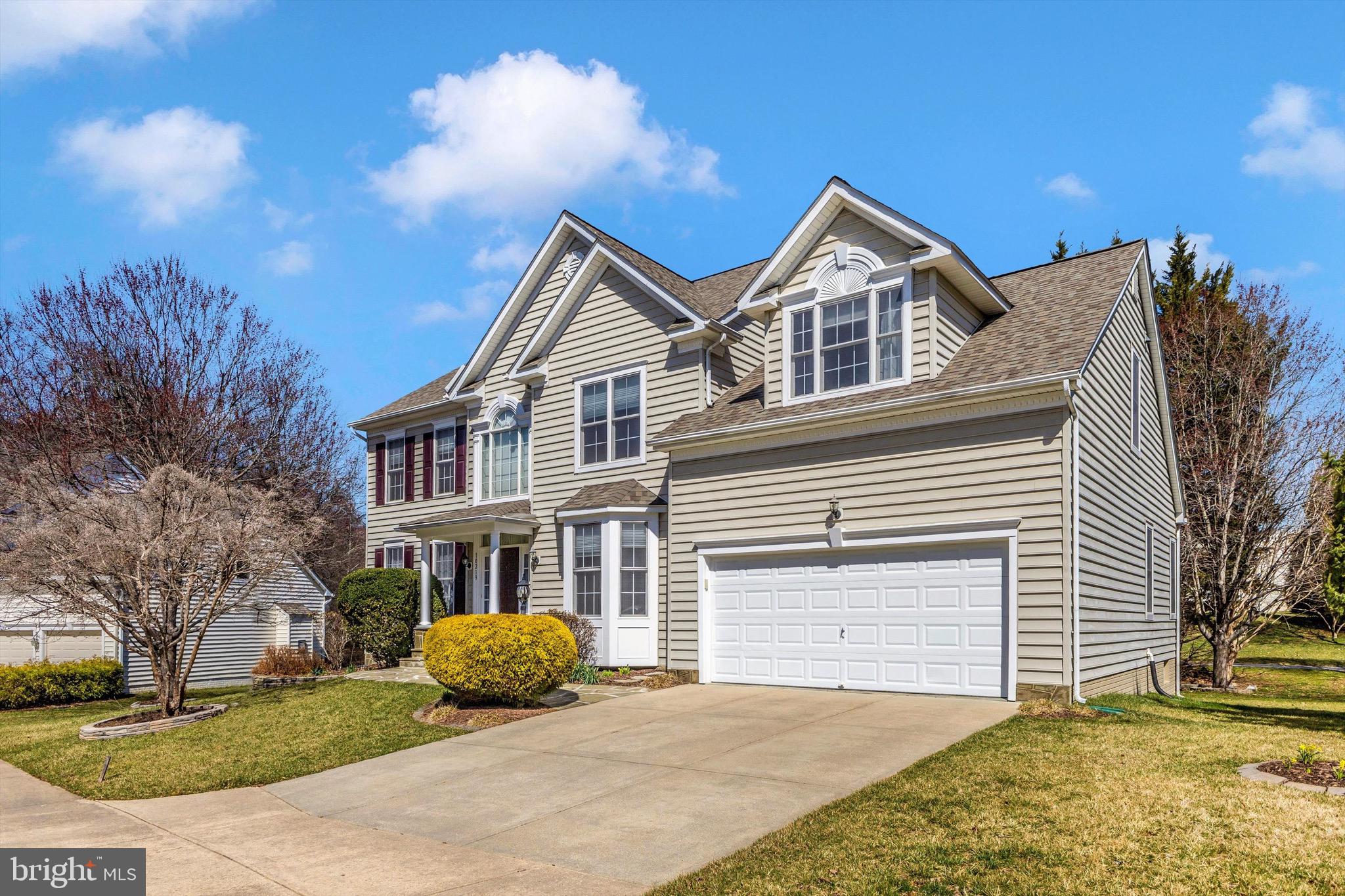 10213 Deep Skies Drive Laurel, MD 20723 - Photo 2 of 56 a view of a yard in front of a house