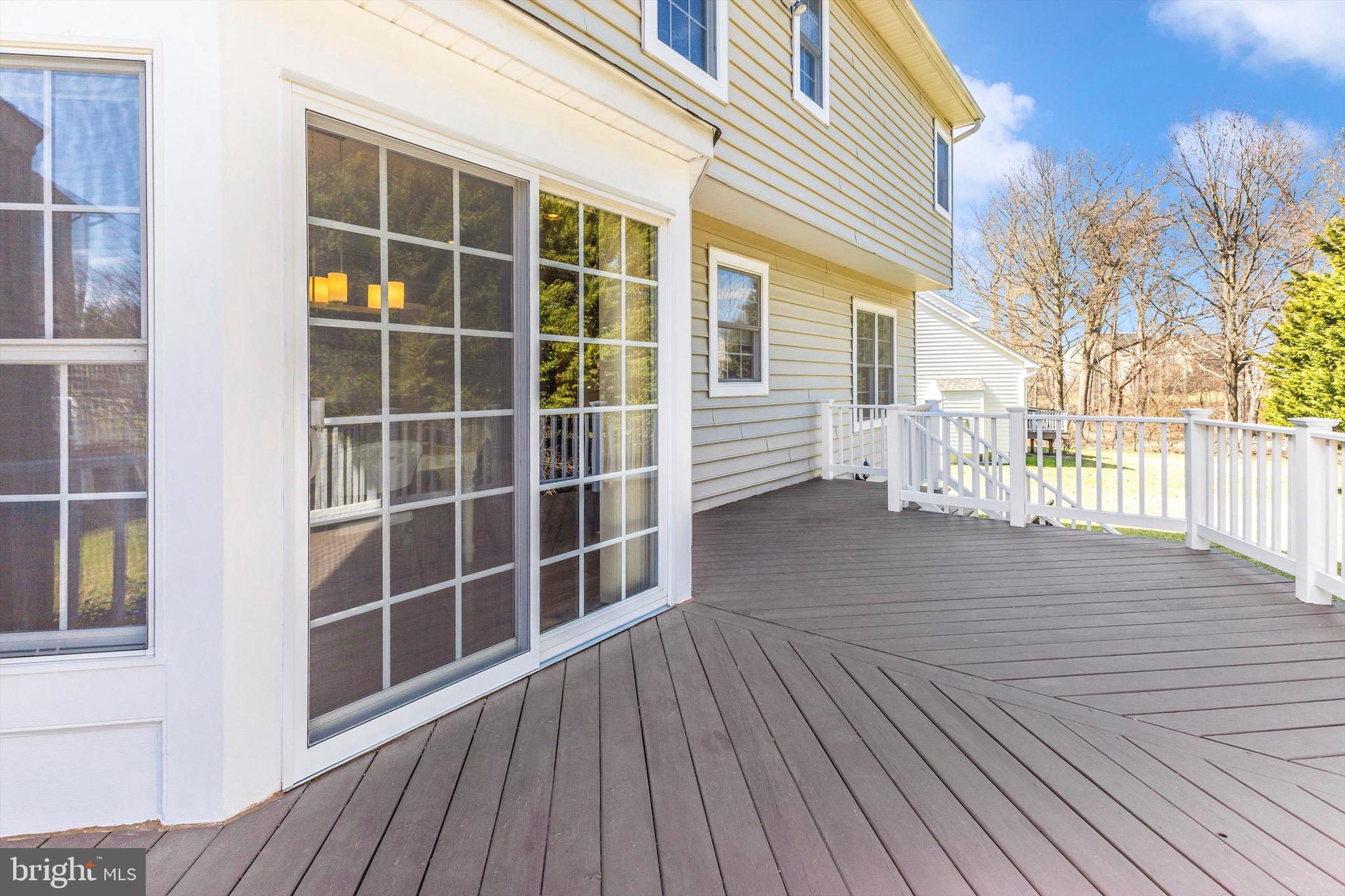 10213 Deep Skies Drive Laurel, MD 20723 - Photo 7 of 56 a view of a house with a large window