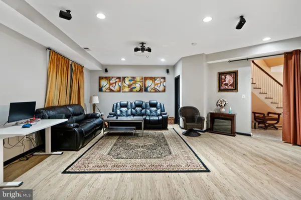 a room with furniture and a wooden floor