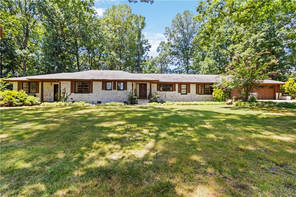 201 Westbrook Road Commerce, GA 30530 - Photo 1 of 1 a view of a house with a big yard