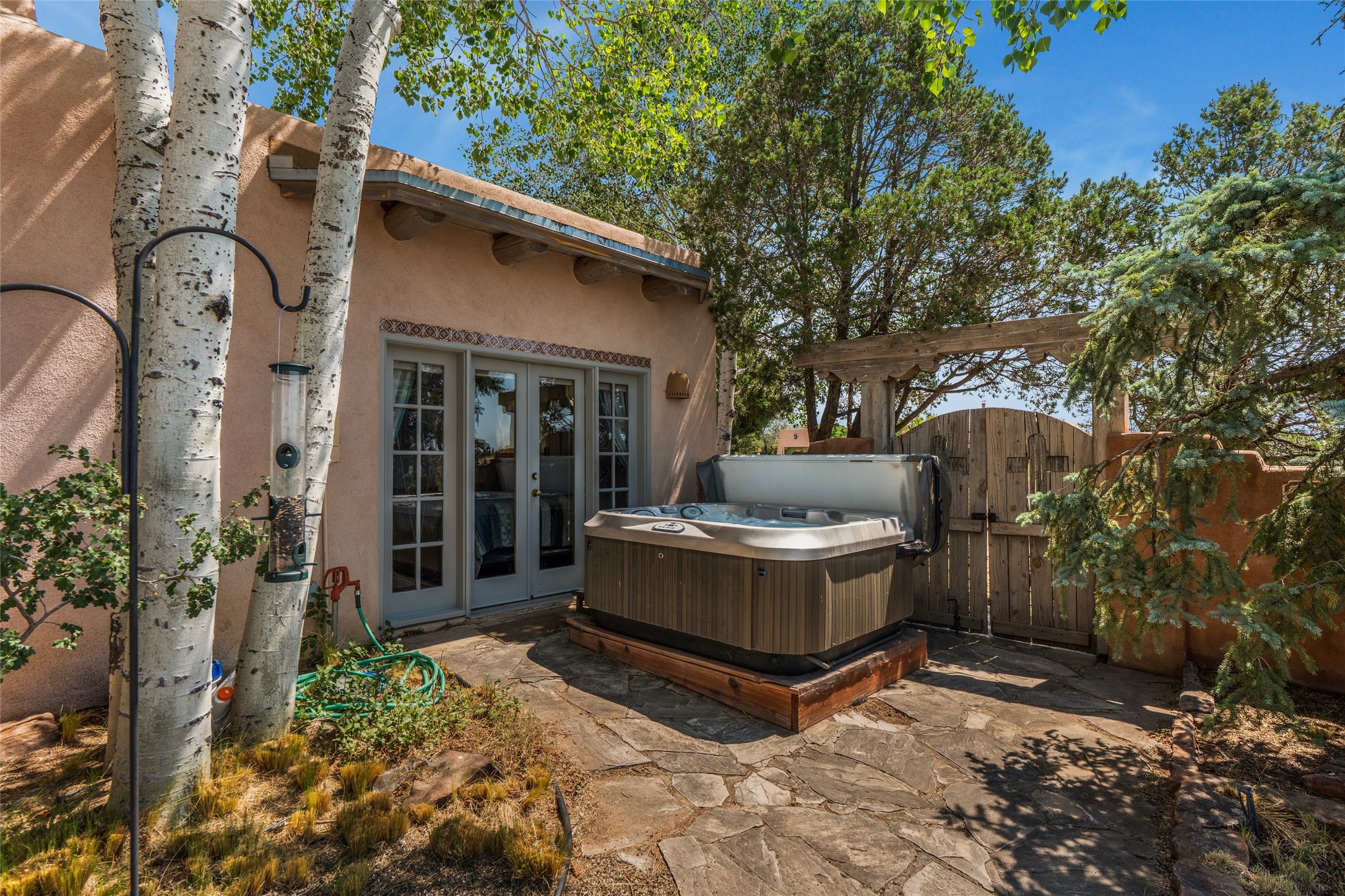 88 Monte Alto Road Santa Fe, NM 87508 - Photo 23 of 43 Hot Tub just outside Primary Suite