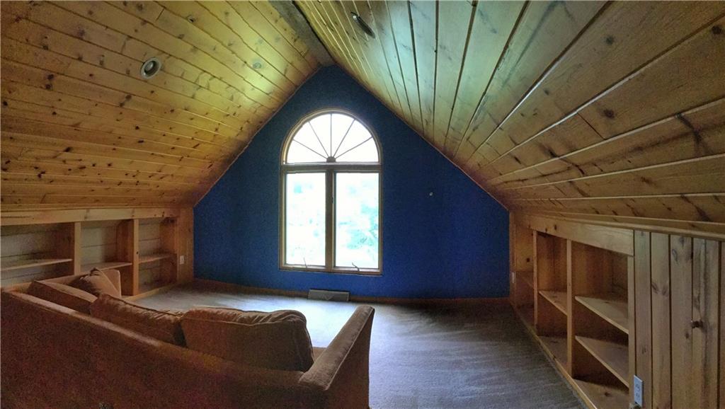 3803 Shepard Road Gibsonia, PA 15044 - Photo 7 of 25 14x13 loft with built-in book cases and vaulted ceilings. Window looks out across the yard.