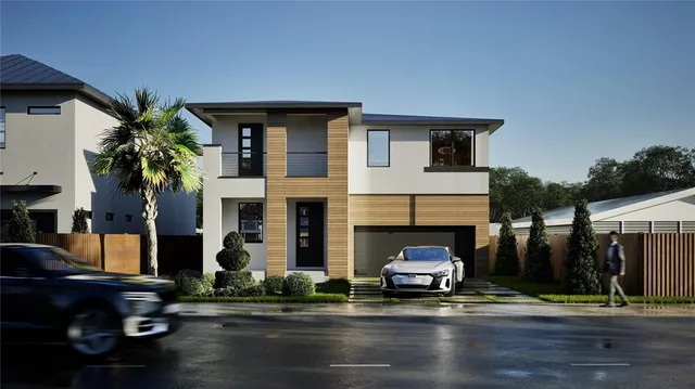 a car parked in front of a house