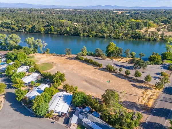 an aerial view of lake residential house with outdoor space