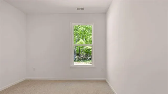 an empty room with windows