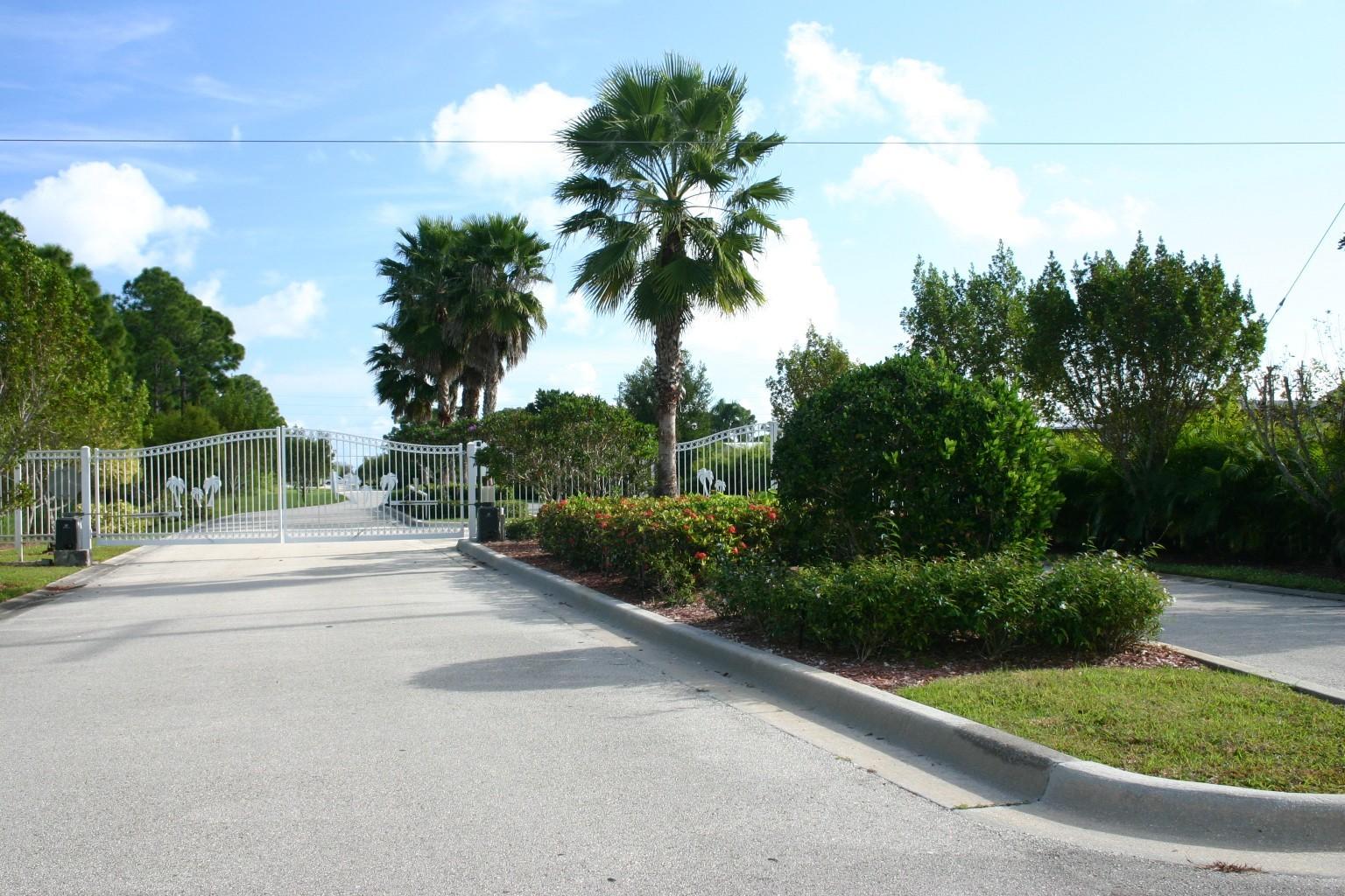 2456 Southeast Springtree Place Stuart, FL 34997 - Photo 13 of 28 19-Front Gate