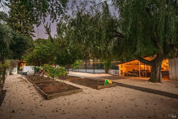 a bedroom with a large bed and a couch