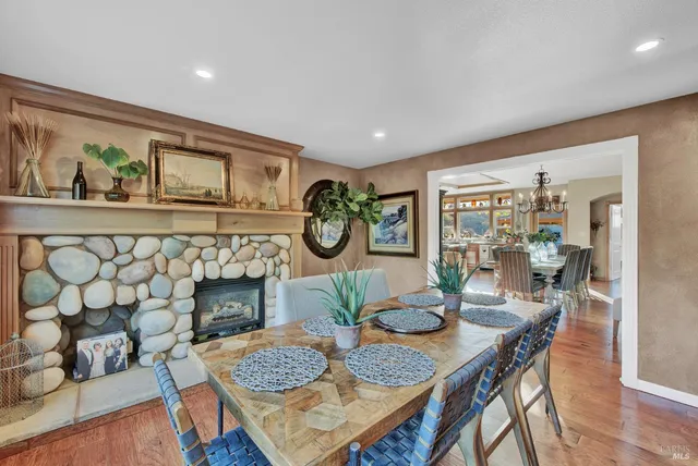a kitchen with a stove and a white cabinets