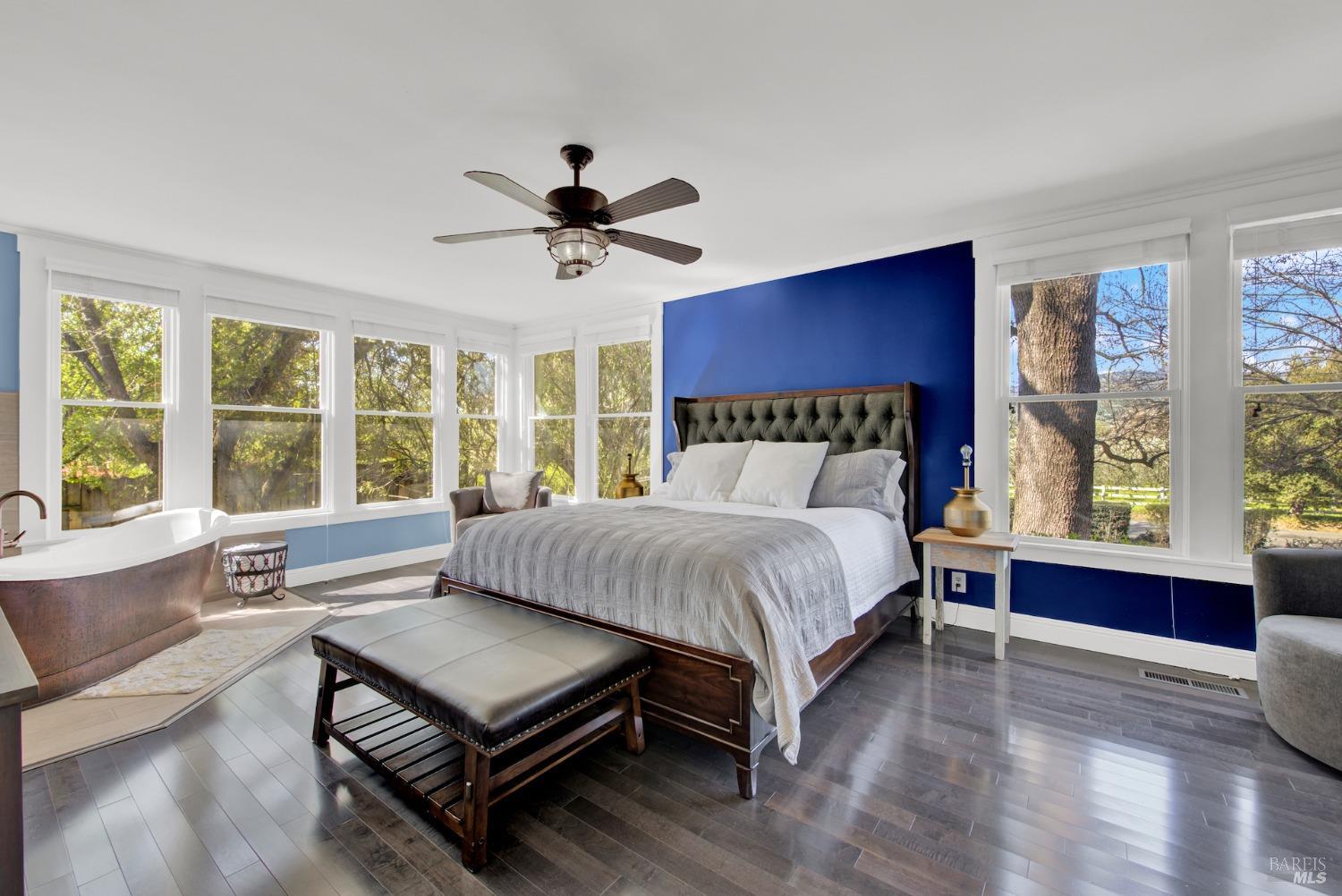 5066 Clayton Road Fairfield, CA 94534 - Photo 31 of 75 a bed sitting in a spacious bedroom next to a window