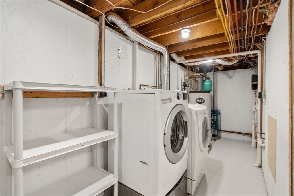 266 Hunnewell Street, Unit 266 Needham, MA 02494 - Photo 33 of 39 a utility room with dryer and washer