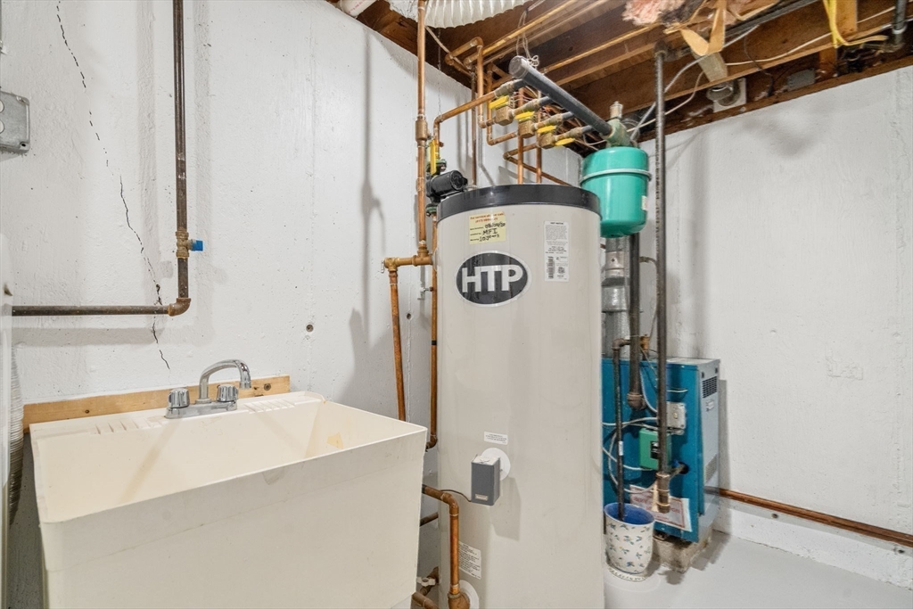 266 Hunnewell Street, Unit 266 Needham, MA 02494 - Photo 34 of 39 a utility room with dryer and washer