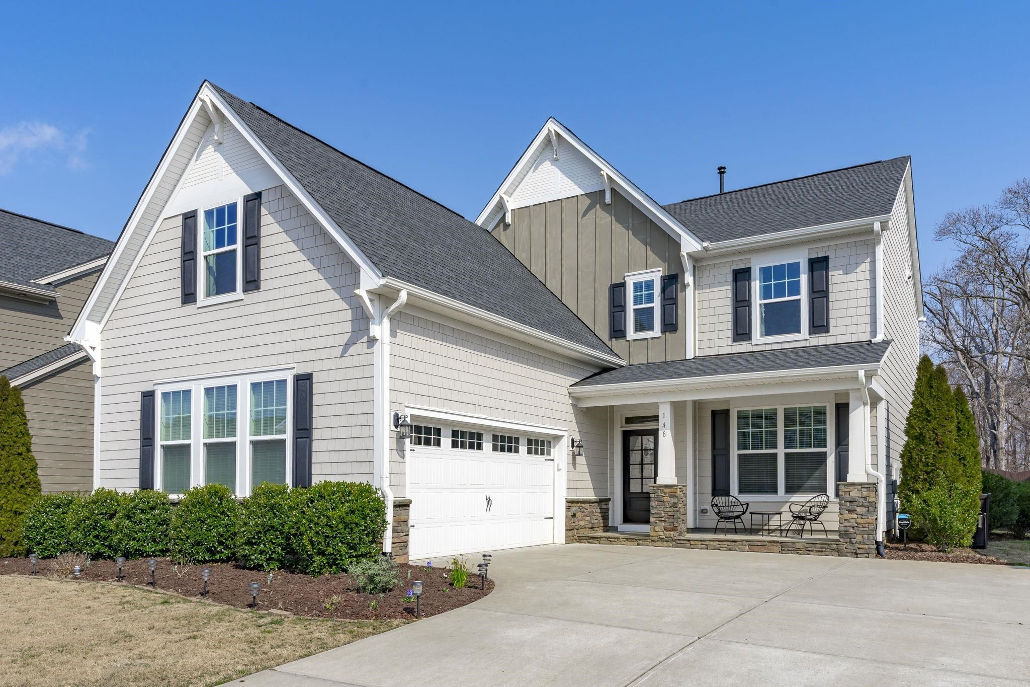 148 Morgan Ridge Road Holly Springs, NC 27540 - Photo 2 of 31 Side Load 2-Car Garage with Ample Guest Parking