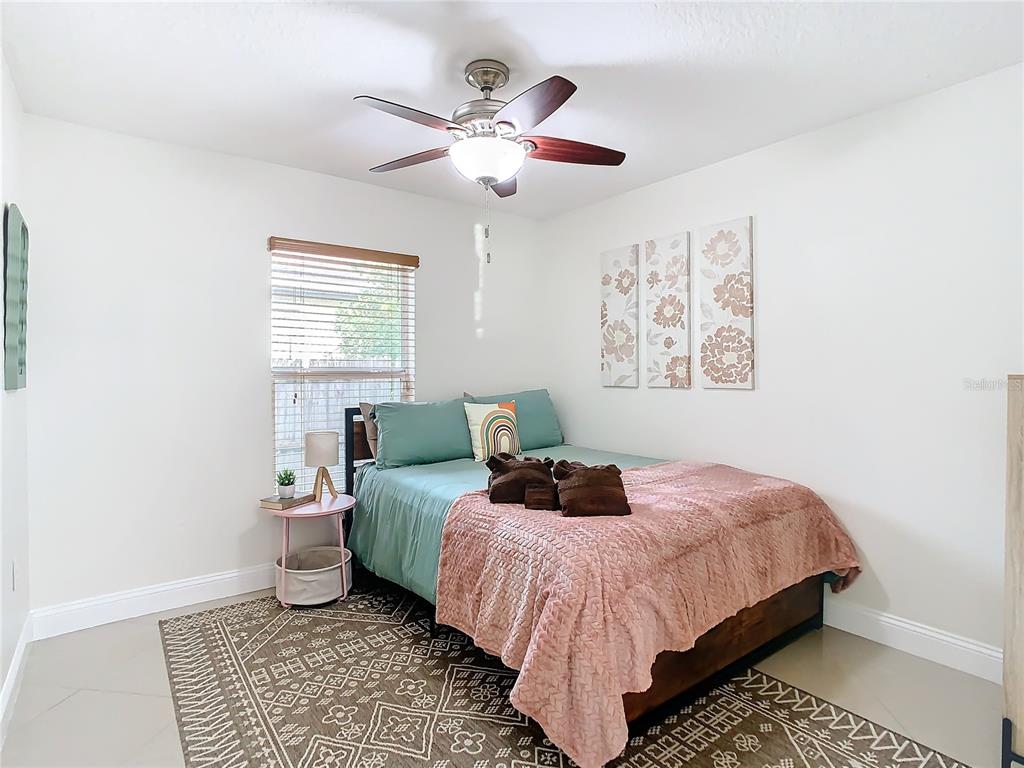 2907 West Arch Street Tampa, FL 33607 - Photo 25 of 48 a bedroom with bed and a window