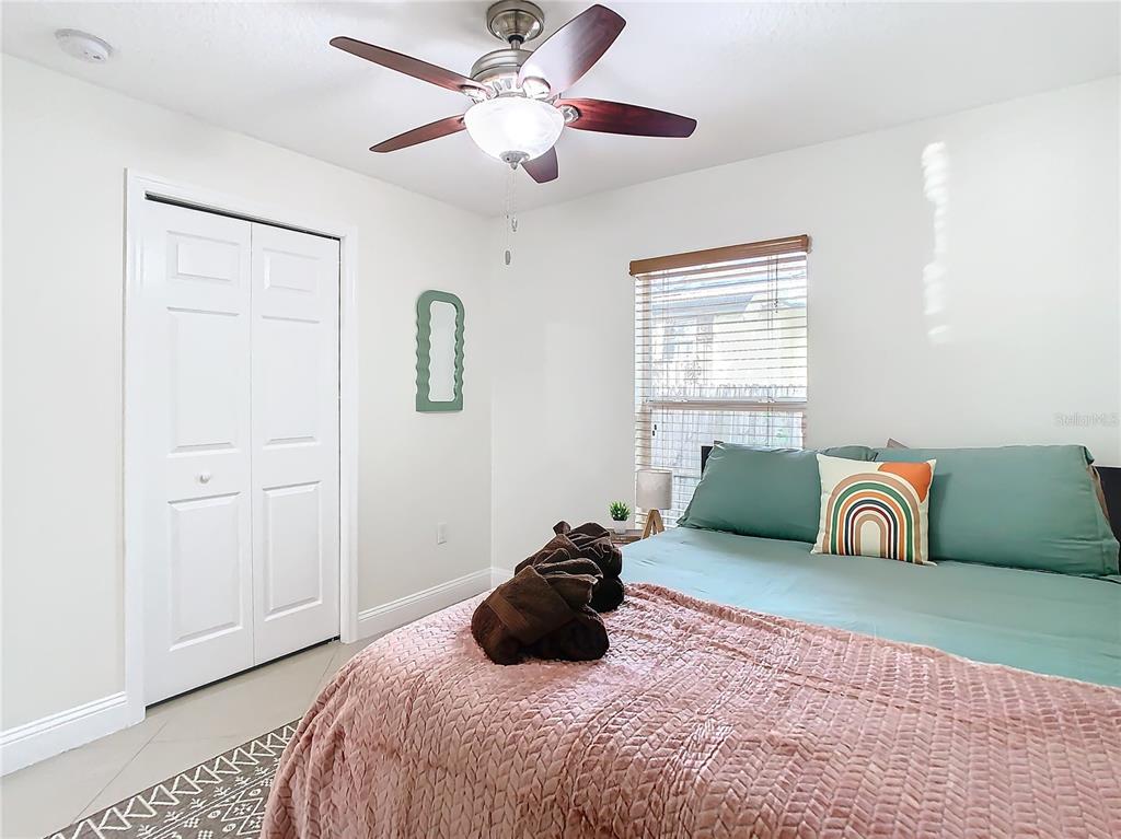 2907 West Arch Street Tampa, FL 33607 - Photo 27 of 48 a bedroom with a large bed and a window