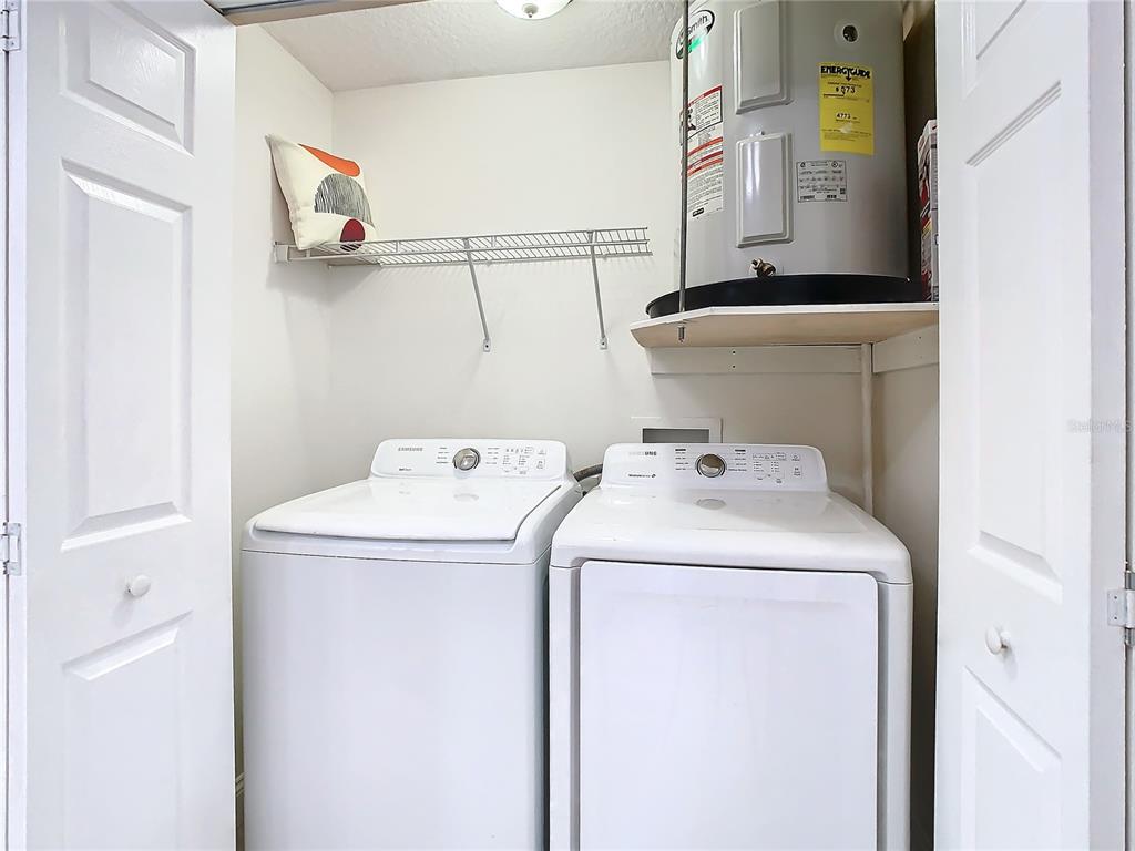 2907 West Arch Street Tampa, FL 33607 - Photo 37 of 48 a utility room with dryer and washer