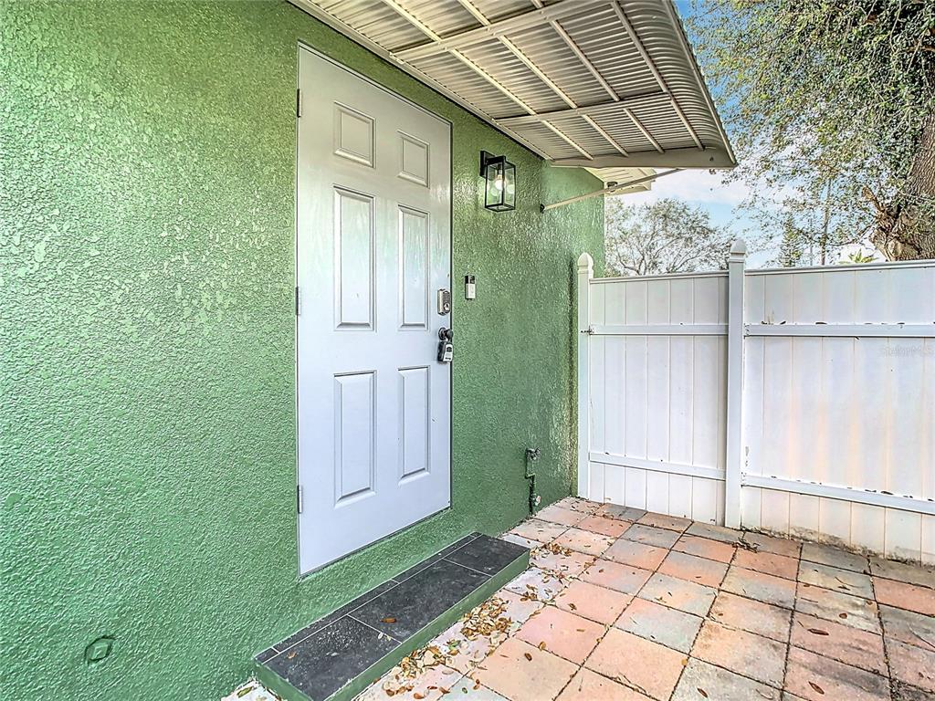 2907 West Arch Street Tampa, FL 33607 - Photo 48 of 48 a view of entryway with a backyard