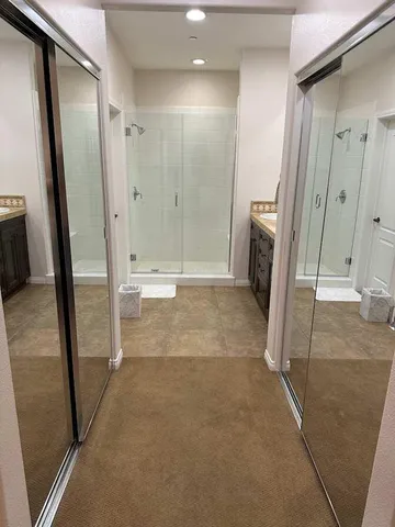 a view of a bathroom with shower