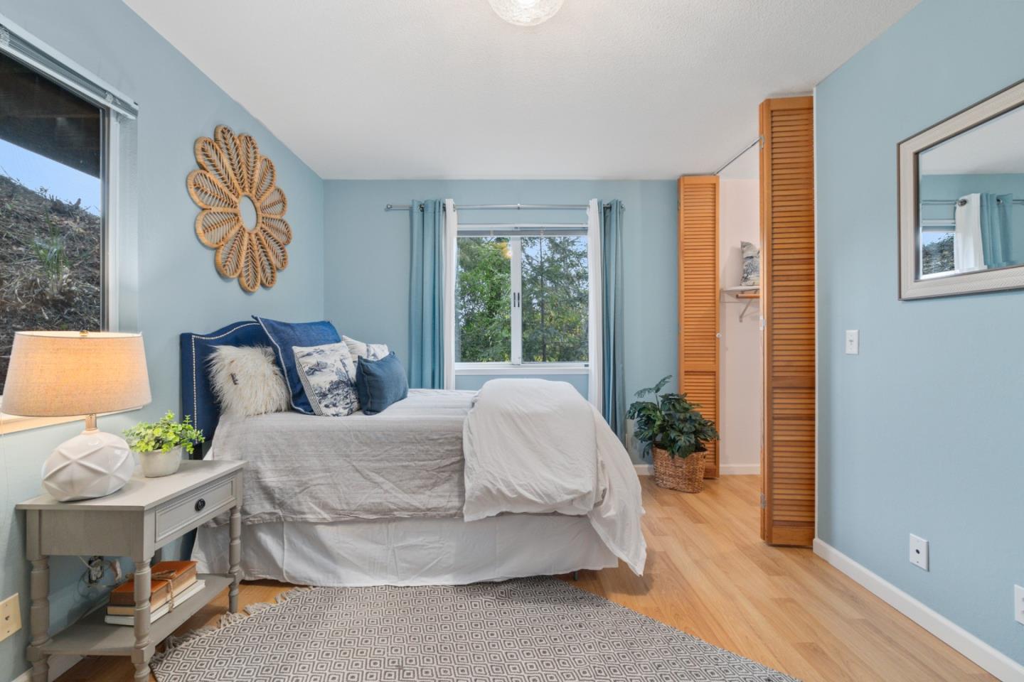 2345 Laurel Glen Road Soquel, CA 95073 - Photo 18 of 63 a spacious bedroom with a bed and window