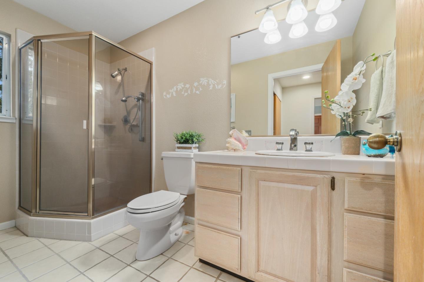 2345 Laurel Glen Road Soquel, CA 95073 - Photo 20 of 63 a bathroom with a double vanity sink mirror and toilet
