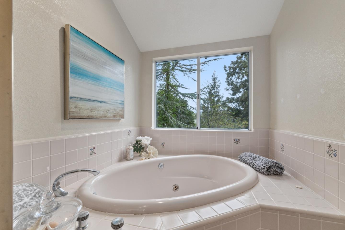 2345 Laurel Glen Road Soquel, CA 95073 - Photo 29 of 63 a bathroom with a tub and a window