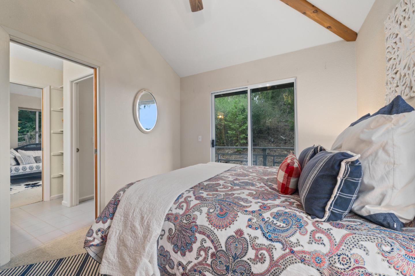 2345 Laurel Glen Road Soquel, CA 95073 - Photo 36 of 63 a bedroom with a bed and a window
