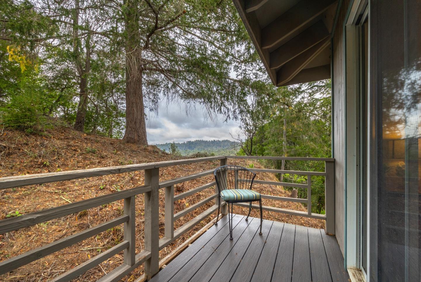 2345 Laurel Glen Road Soquel, CA 95073 - Photo 39 of 63 a view of balcony with wooden floor and outdoor seating