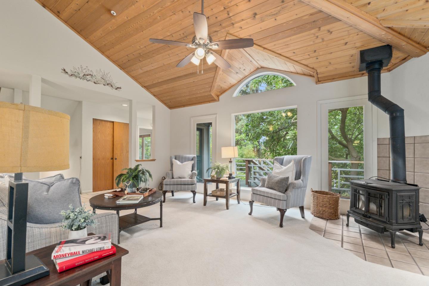 2345 Laurel Glen Road Soquel, CA 95073 - Photo 4 of 63 a living room with furniture fireplace and large windows