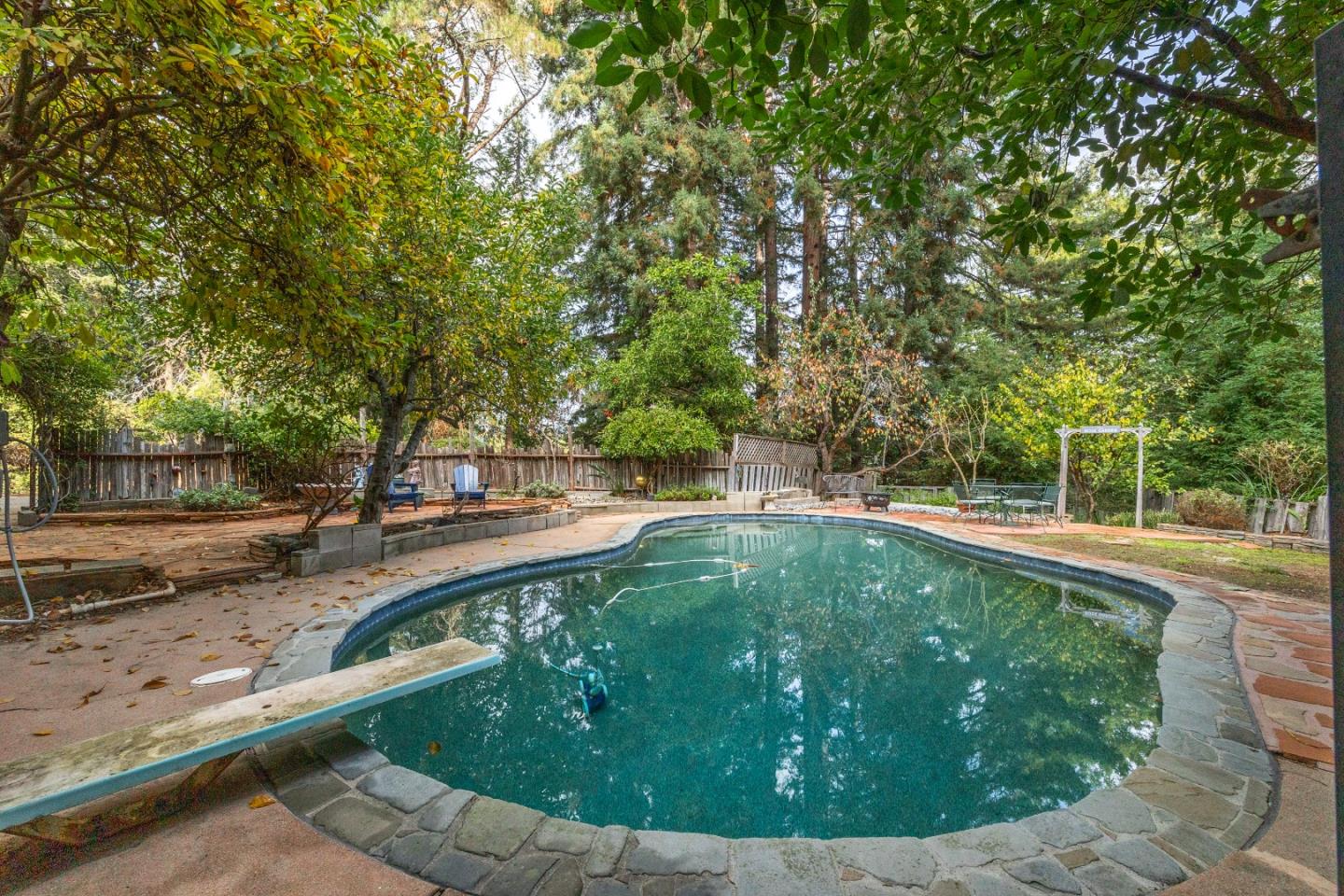 2345 Laurel Glen Road Soquel, CA 95073 - Photo 52 of 63 a view of a swimming pool with a yard