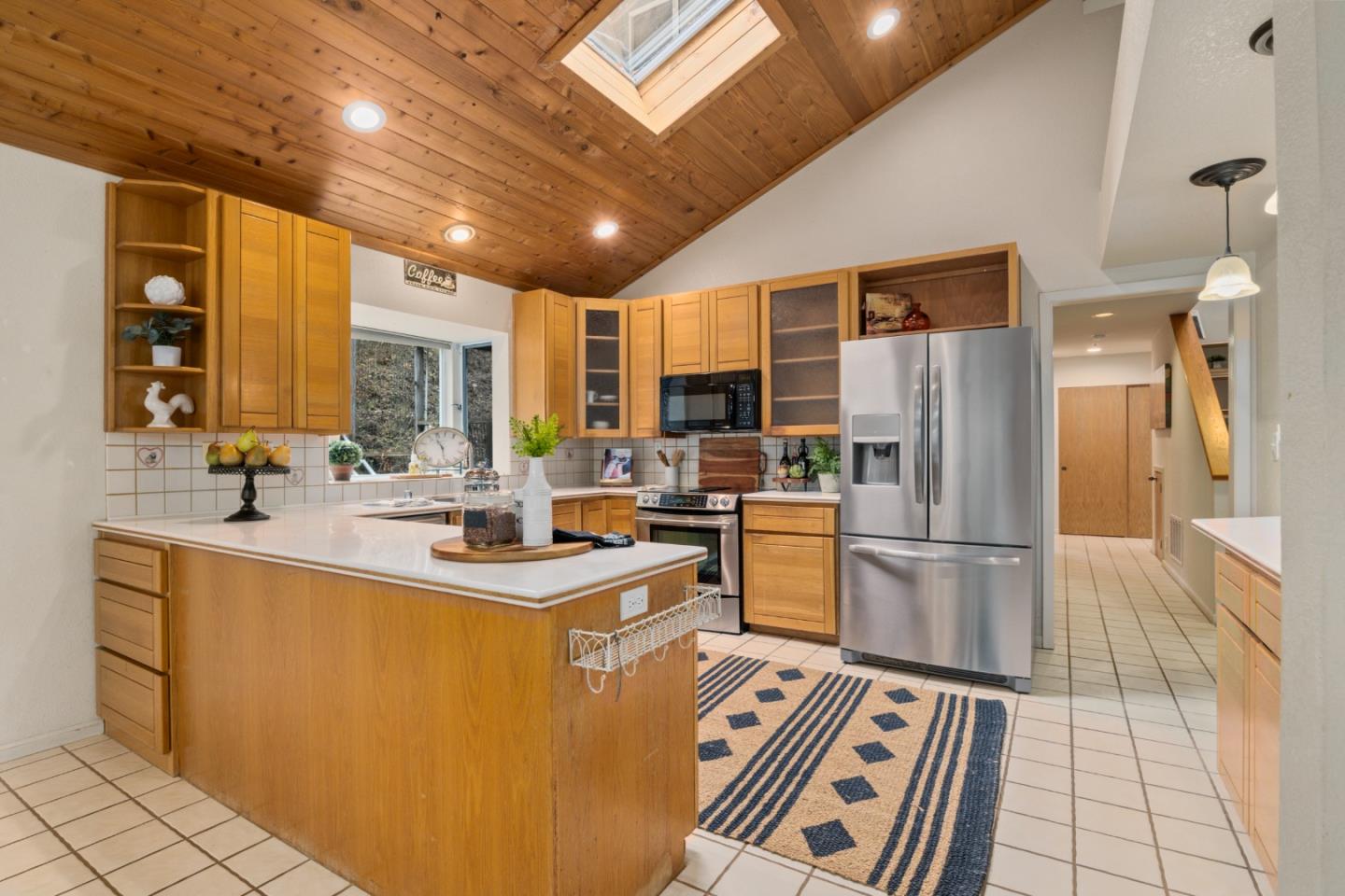 2345 Laurel Glen Road Soquel, CA 95073 - Photo 9 of 63 a kitchen with a sink stainless steel appliances and a counter top space