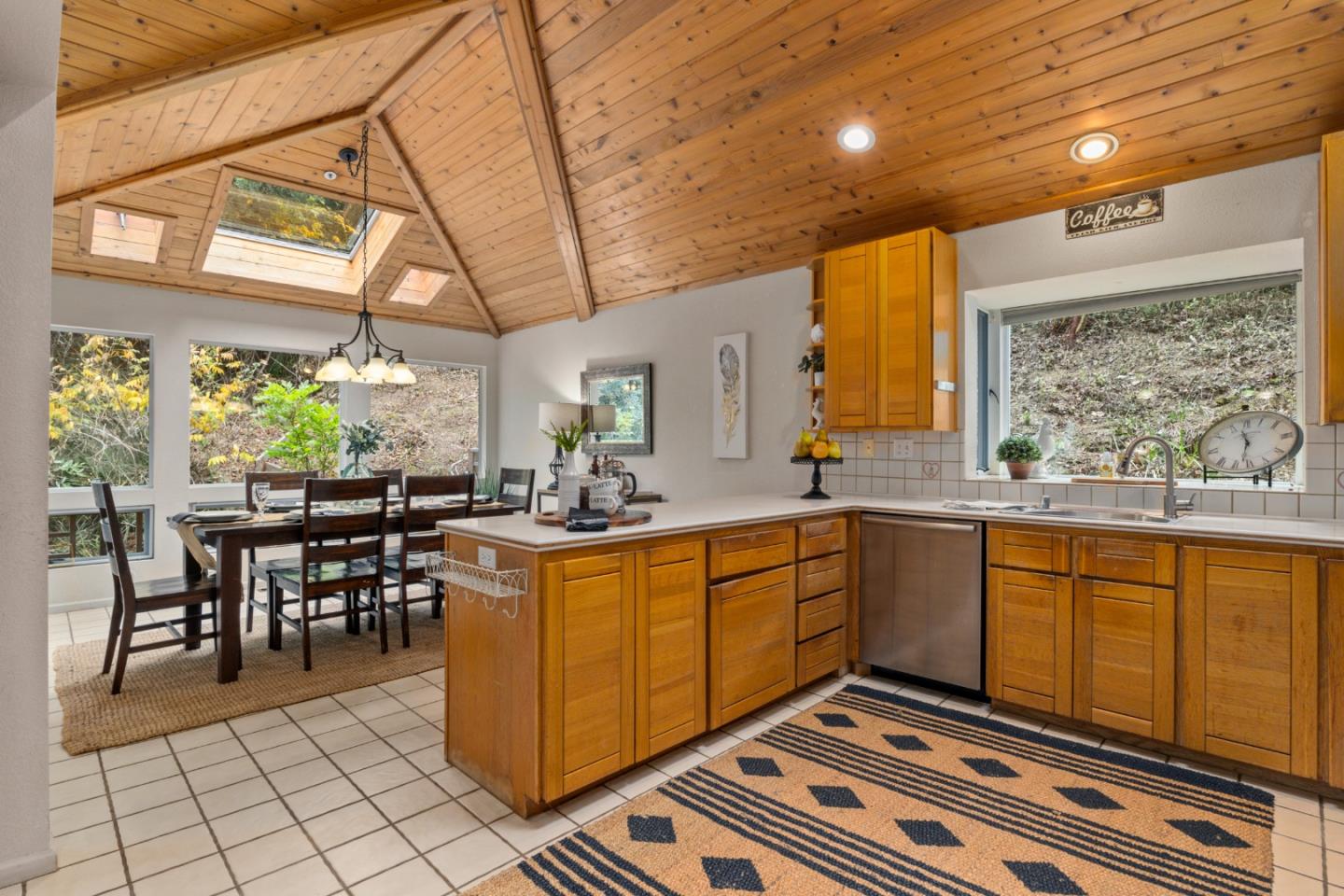 2345 Laurel Glen Road Soquel, CA 95073 - Photo 10 of 63 a kitchen with stainless steel appliances granite countertop a stove a sink and a microwave