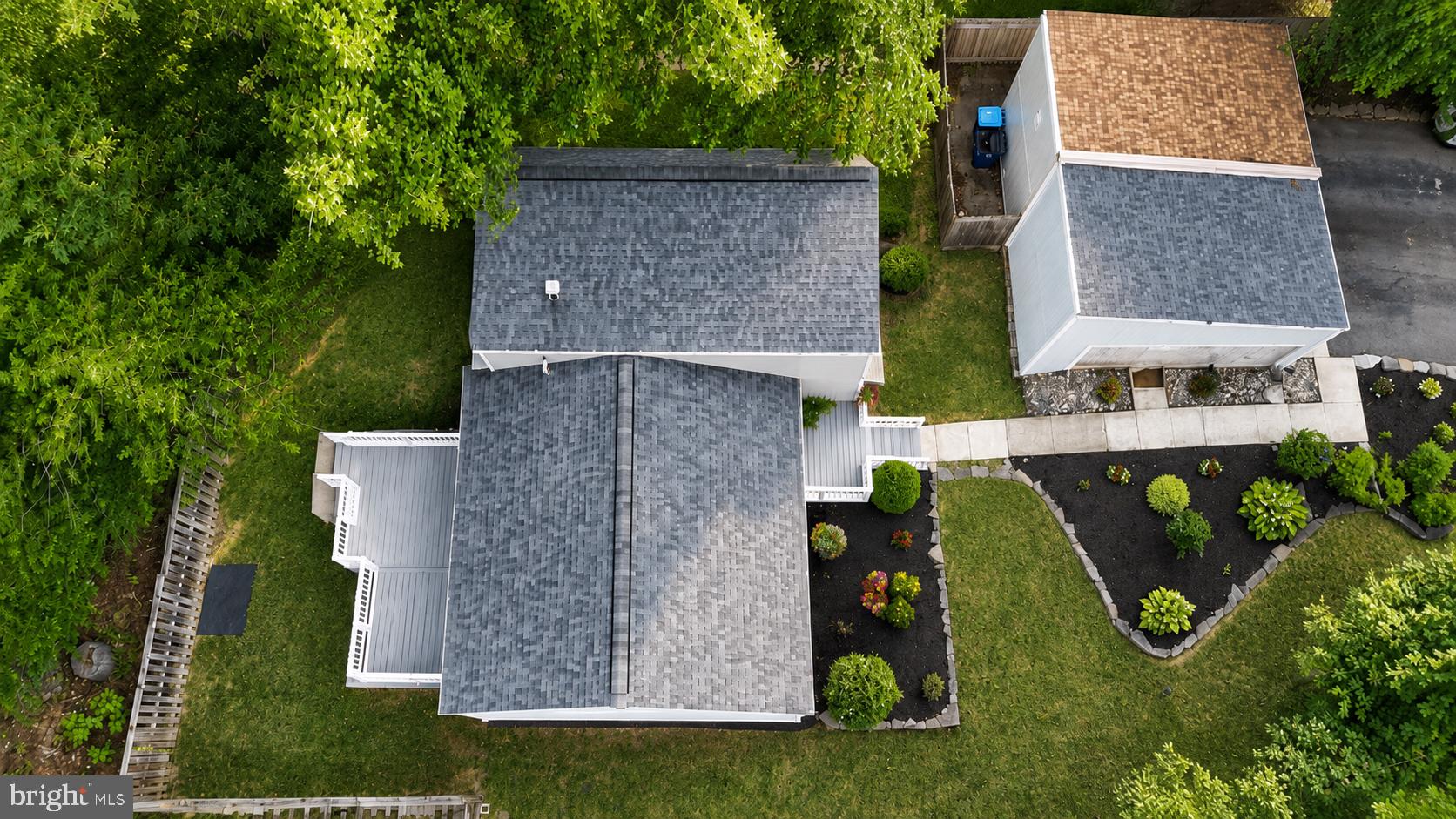 2240 Sanibel Drive Reston, VA 20191 - Photo 4 of 10 Newer roof with deck facing trees