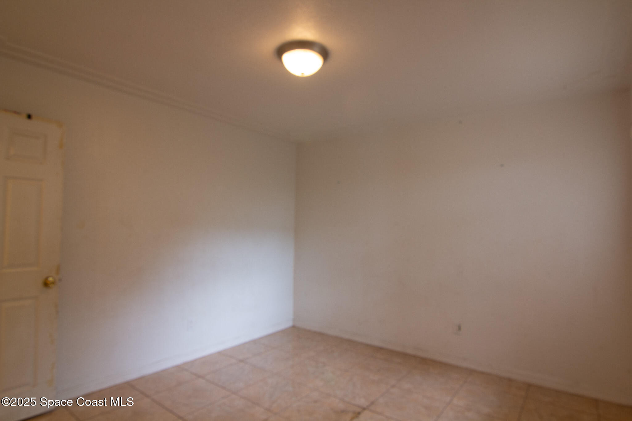 981 Palmer Street Rockledge, FL 32955 - Photo 34 of 38 a view of an empty room